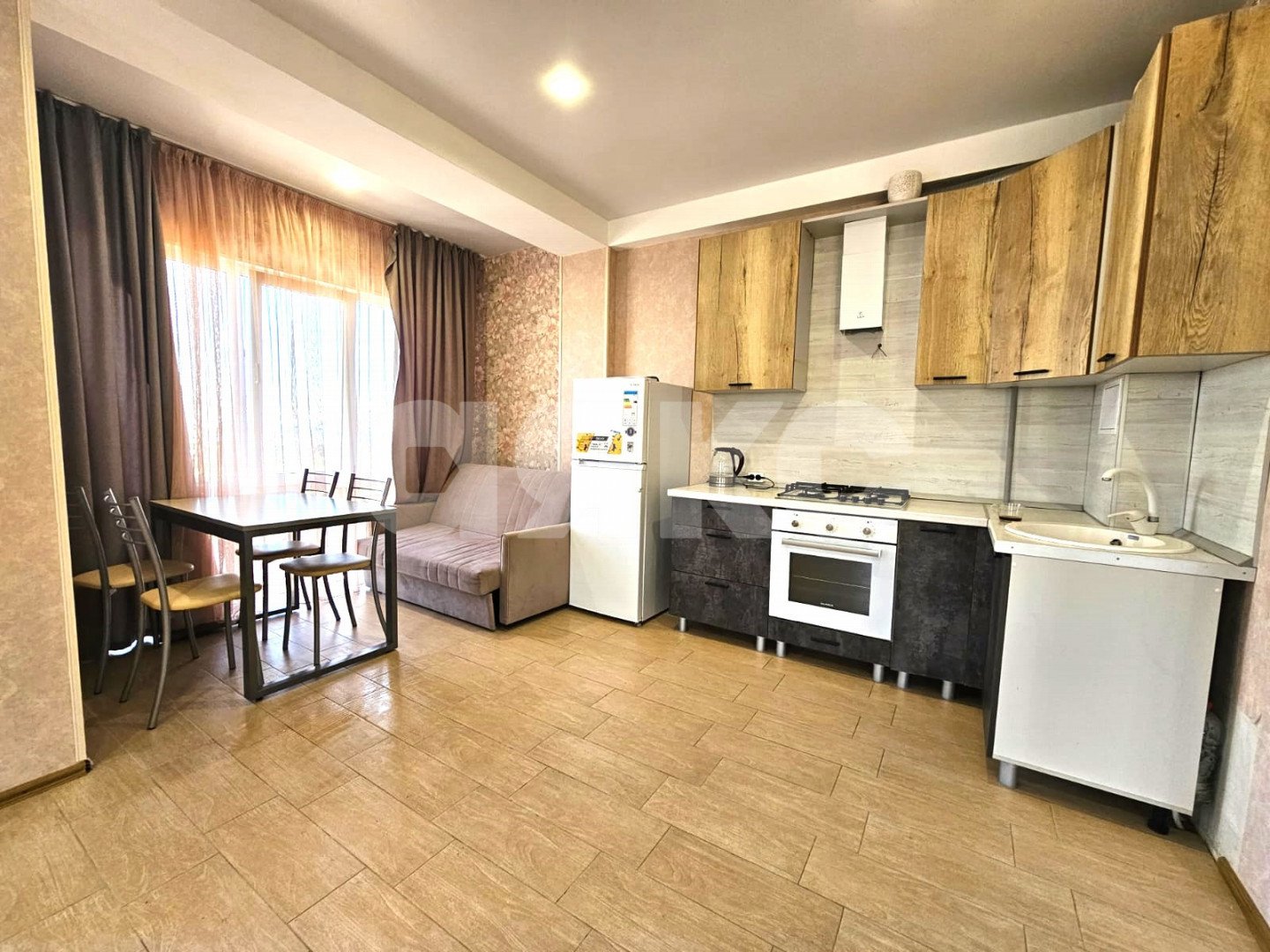 Фото №1: Студия 40 м² - Сочи, Адлерский, Верхнеимеретинская Бухта, мкр. жилой комплекс Санни Хилл Адлер, ул. Каспийская, 46/5